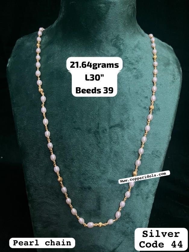 Silver made pearl Mala with gold plating