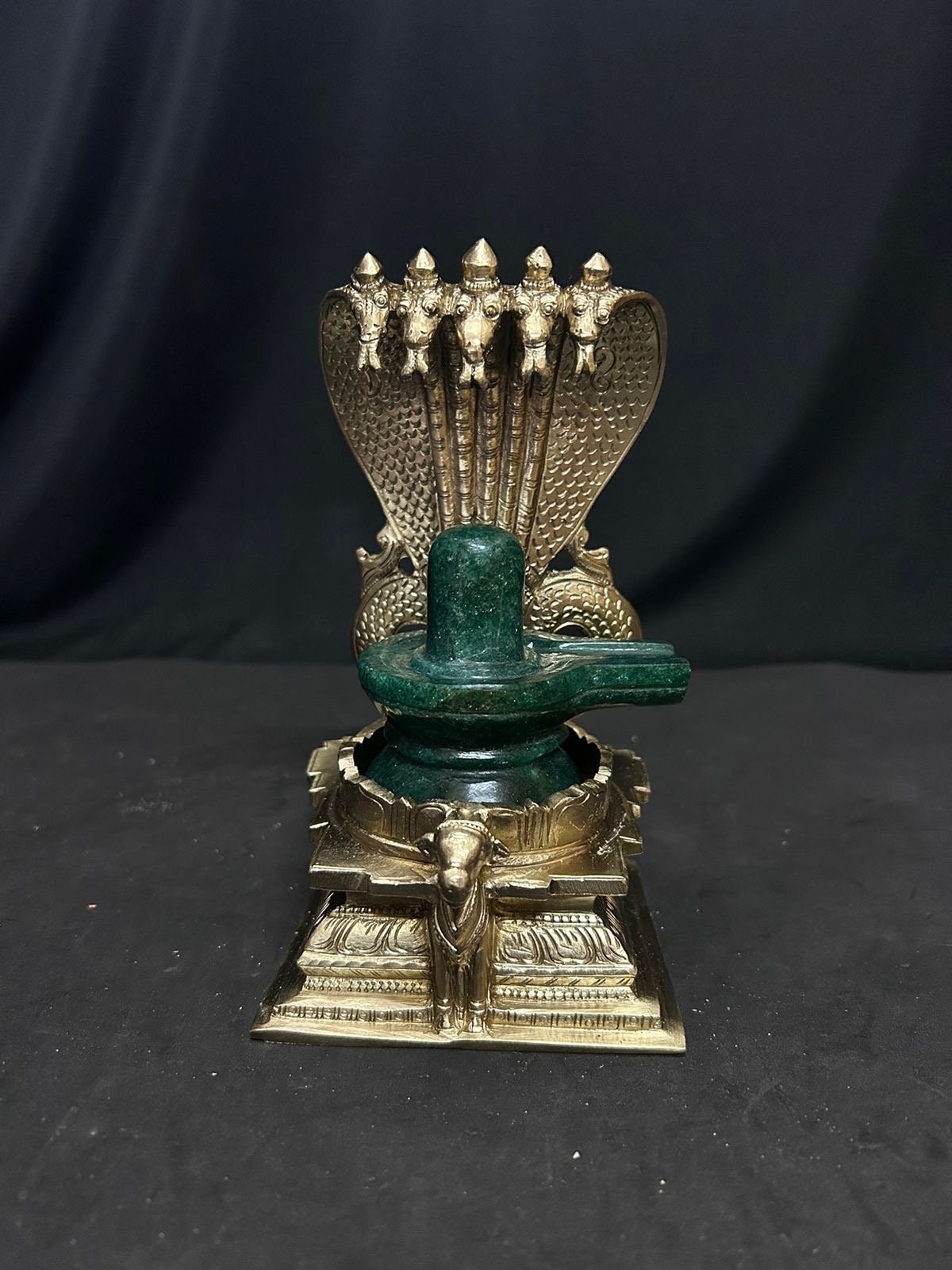 Prasiddh copper idols presents panchaloha idol of Naaga peeta with Green aventurine shiva lingam