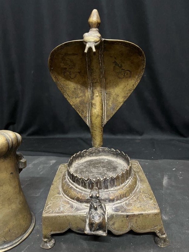 Vintage bronze cast Mukha lingam on a naag nandi peetam