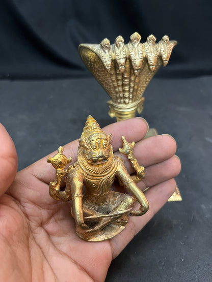 Panchaloha Peeta prabhavali adorned copper made Yoga narasimha swamy idol