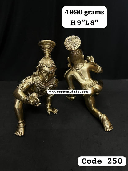 Panchaloha hand crafted crawling bala krishna holding butter ball chola style