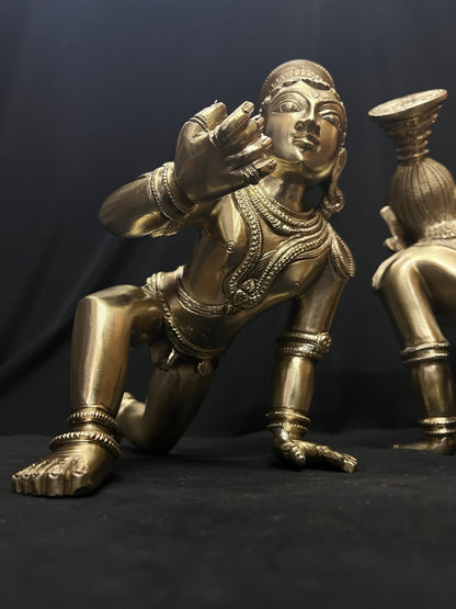 Panchaloha hand crafted crawling bala krishna holding butter ball chola style