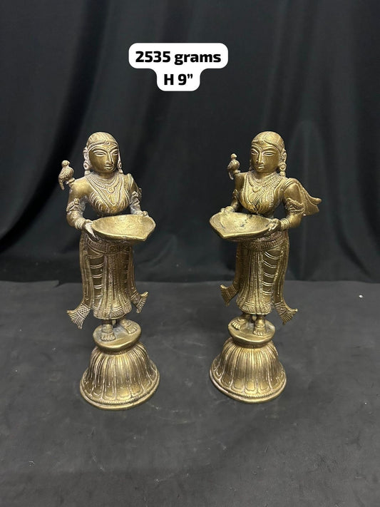 Vintage bronze deepamalli / lady lamp