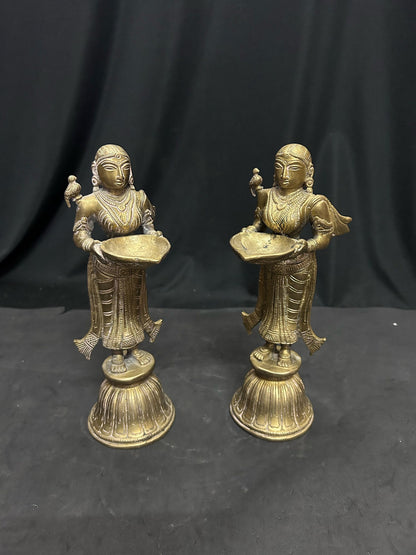 Vintage bronze deepamalli / lady lamp