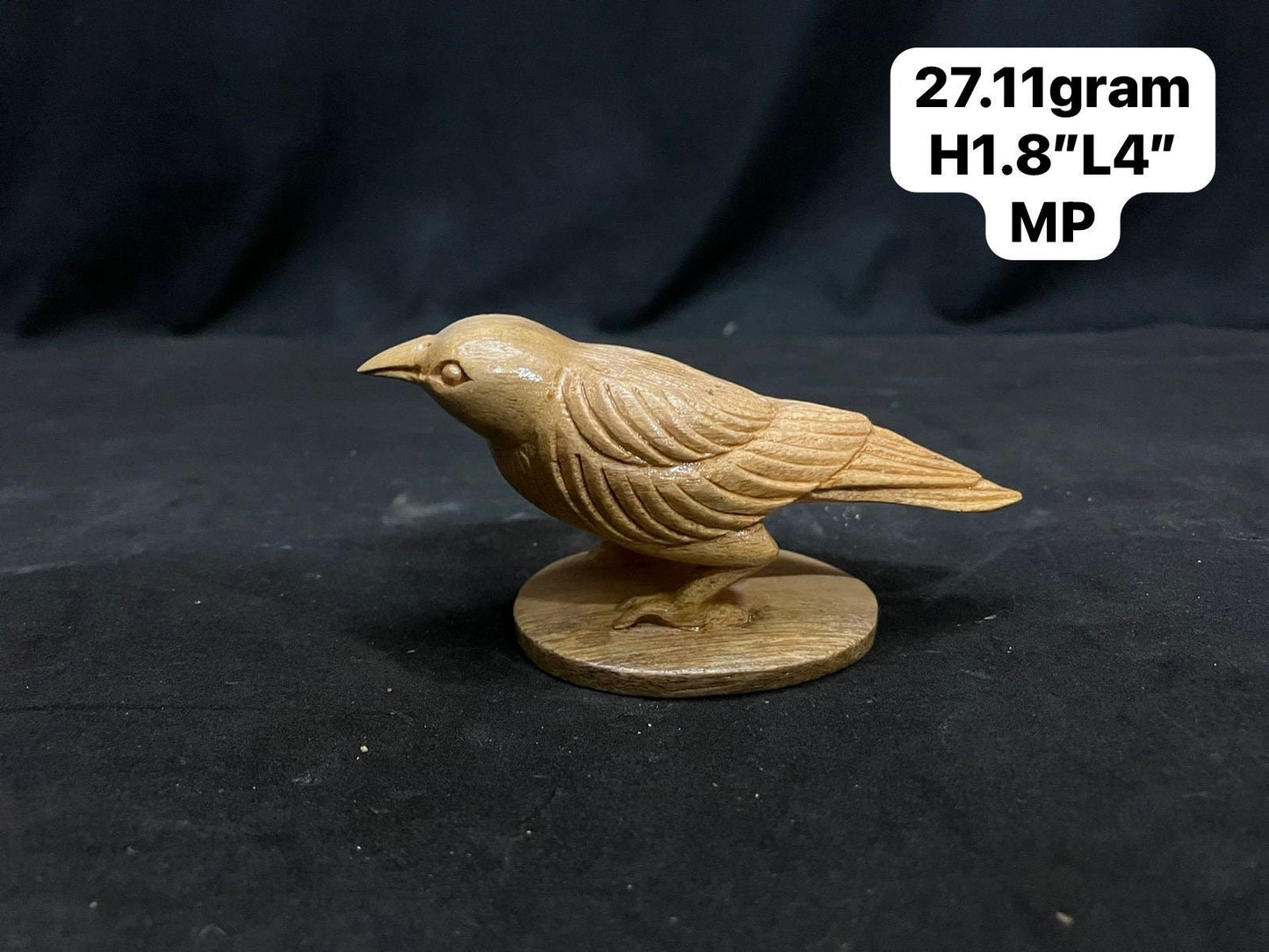 White teak made crow idol