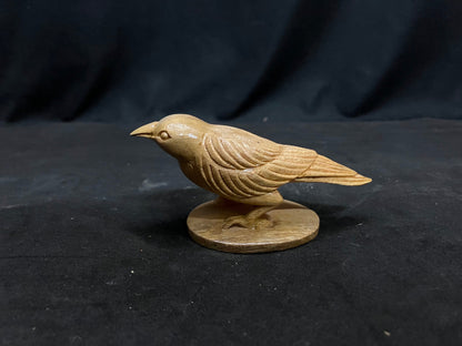 White teak made crow idol