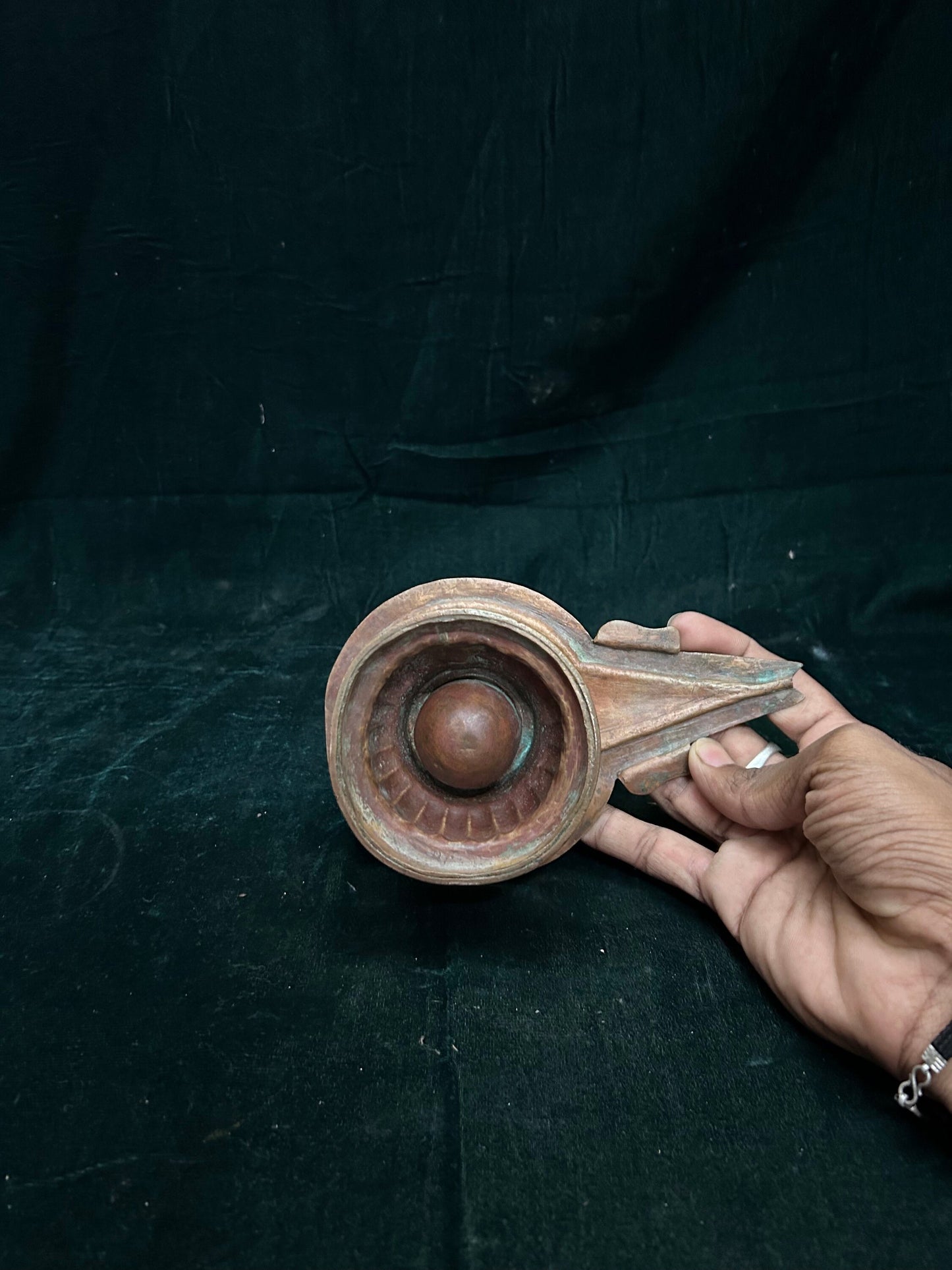 Vintage copper made pani peeta for placing linga