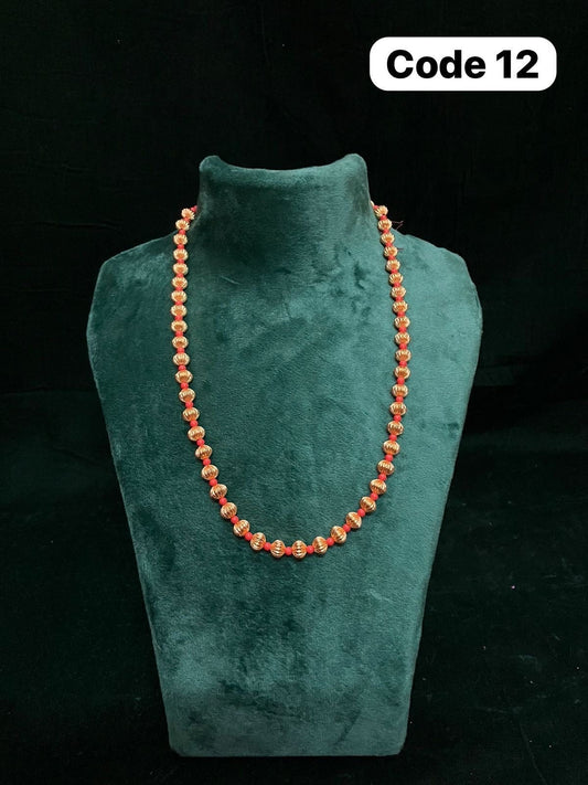 Panchaloha made gold polished gundu mala on a red thread