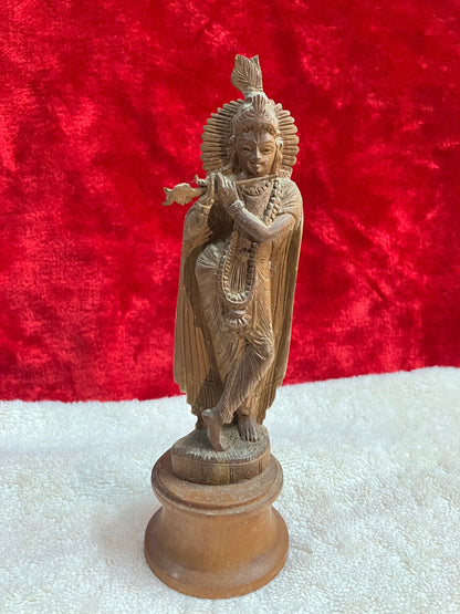 vintage sandalwood krishna figurine