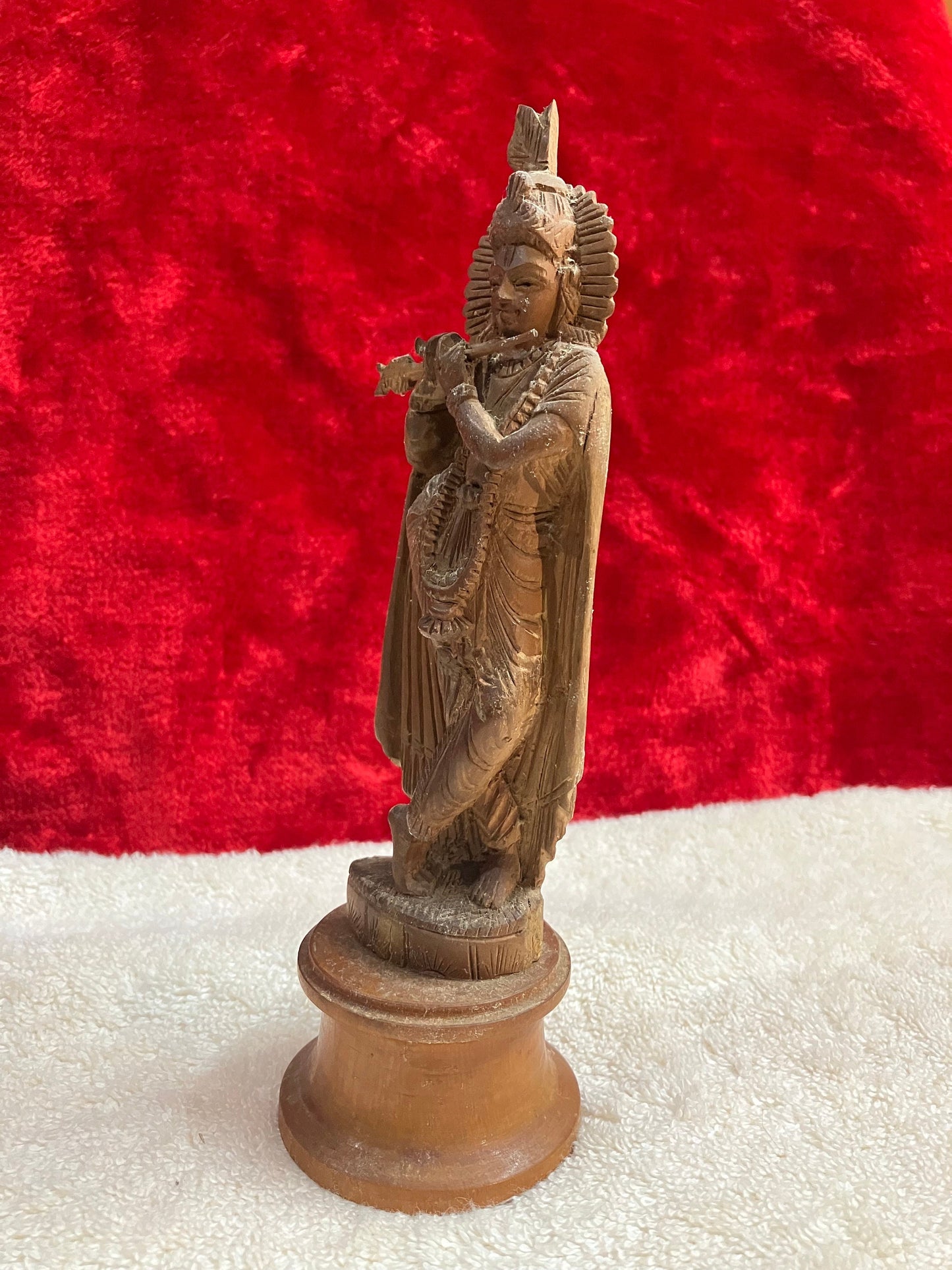 vintage sandalwood krishna figurine