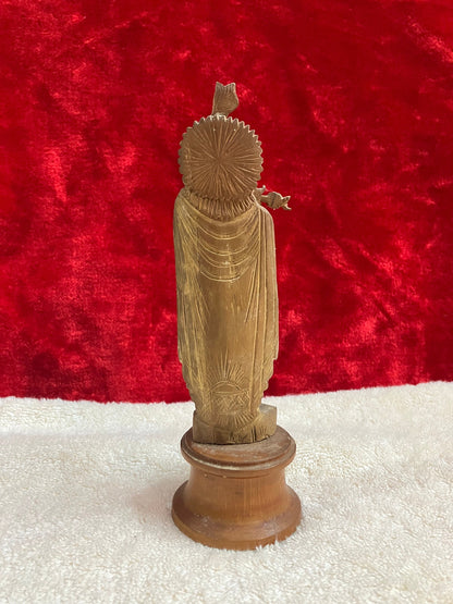 vintage sandalwood krishna figurine