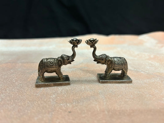 vintage silver made elephant pair