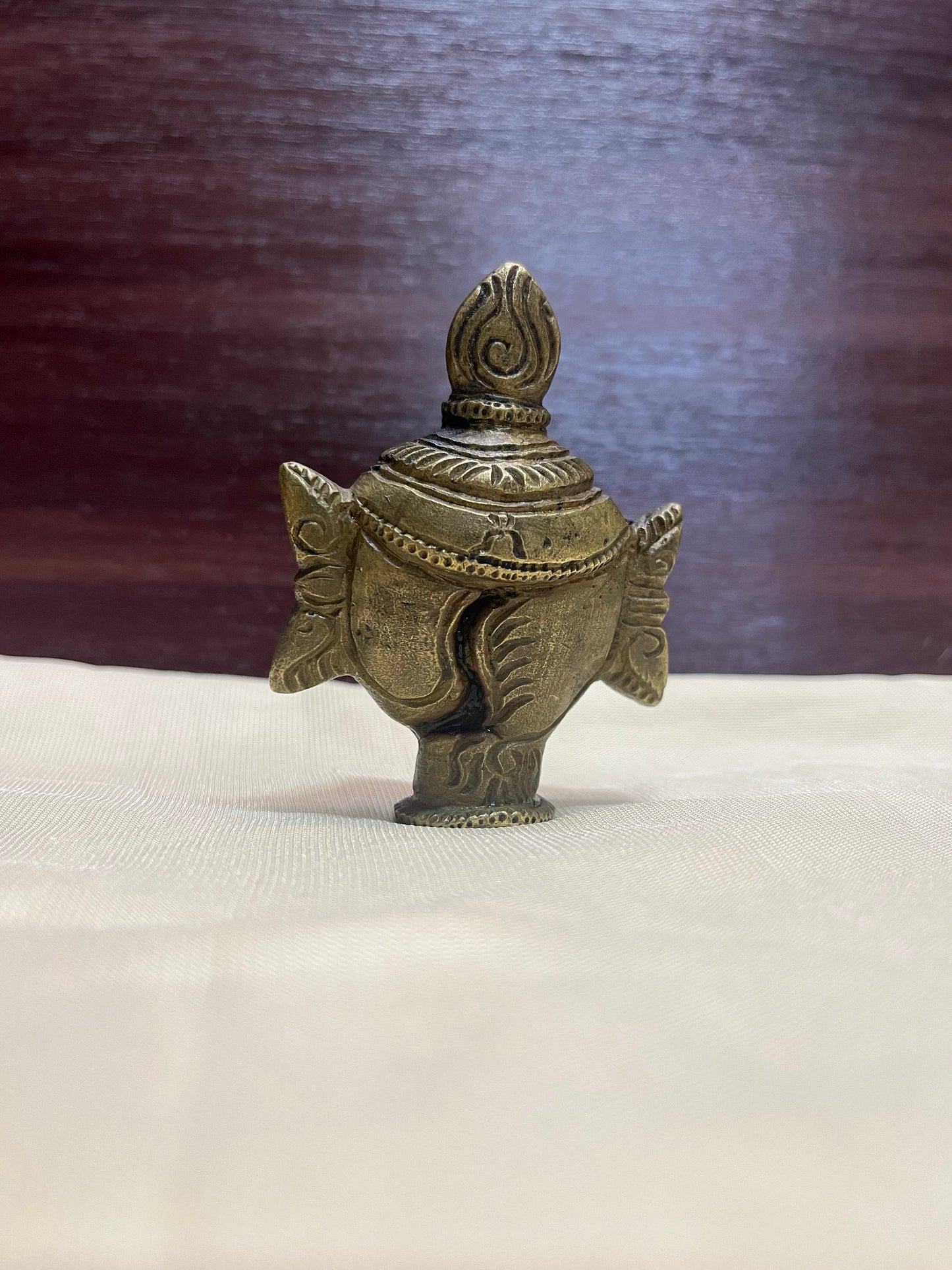 Vintage bronze cast chakra for pooja purposes