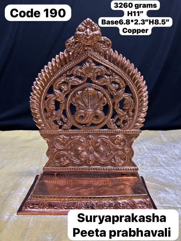 Prasiddh copper idol present copper made surya prakasha peeta prabhavali