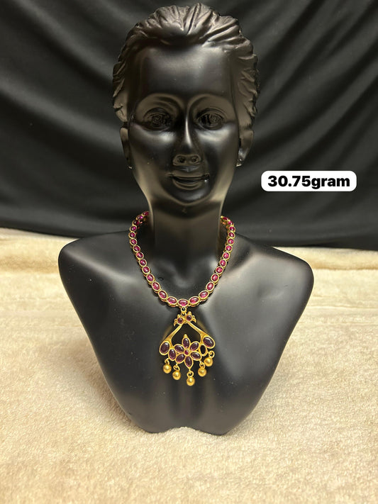 Silver made gold polished ruby necklace with peacock pendant