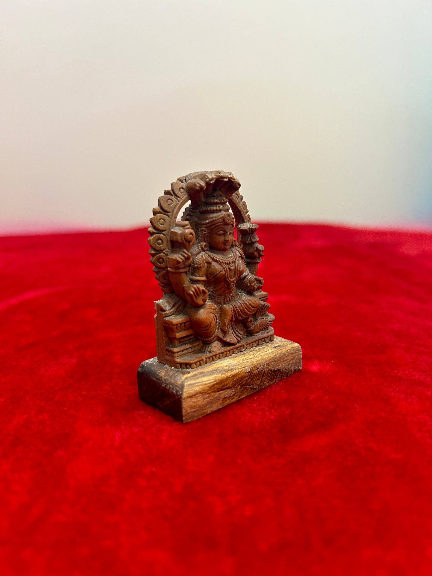 Sandalwood made padmavati idol , jain god