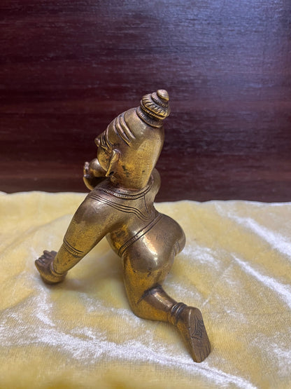 Vintage bronze idol of Crawling butter ball krishna