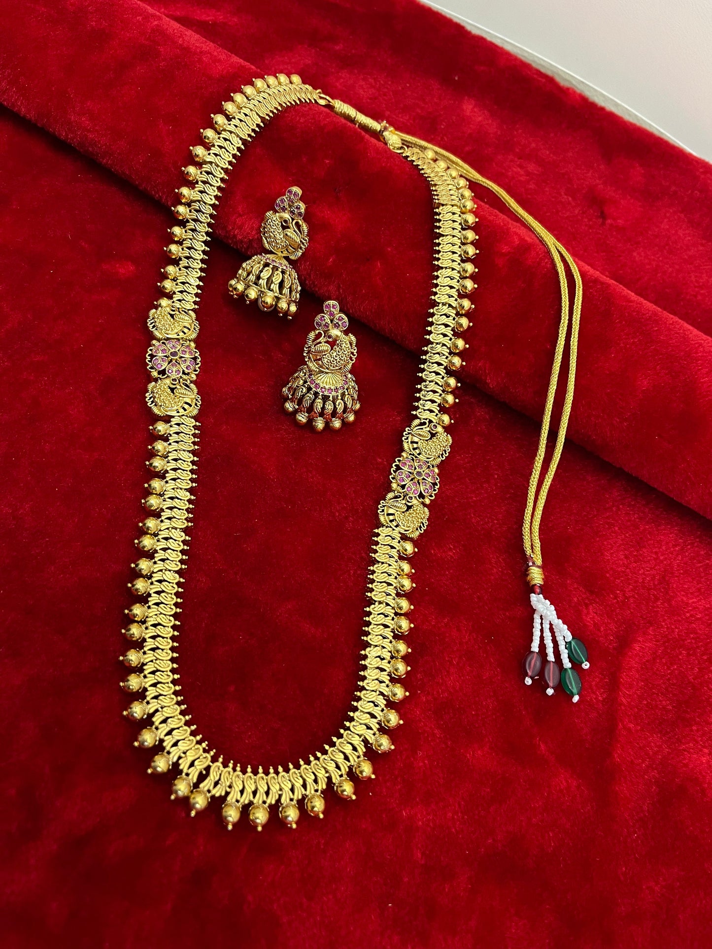 Panchaloha made gold polished elegant long mala haram with double moppu bird with earrings