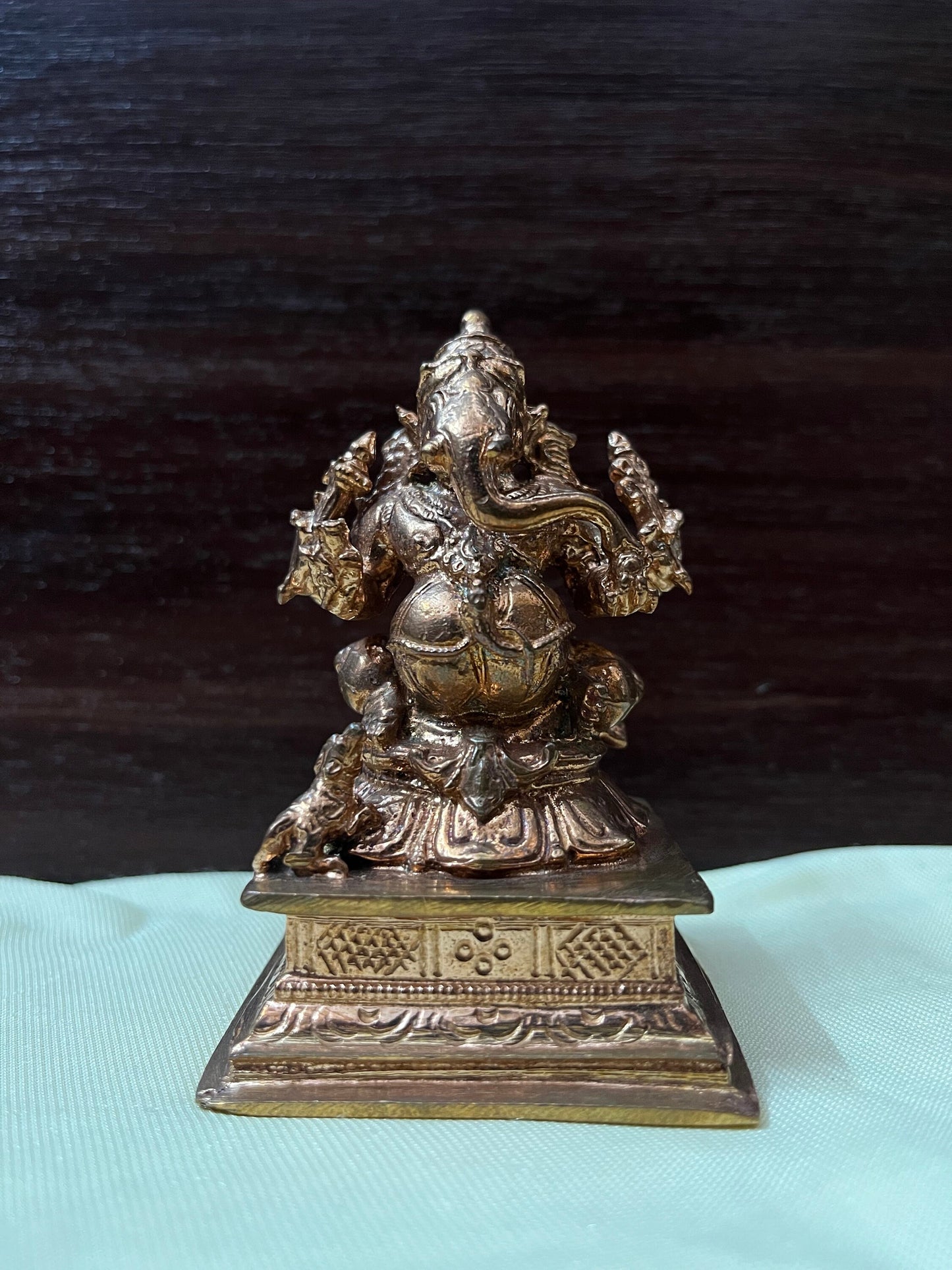 Prasiddh copper idols presents ganapathi on a pedeastal