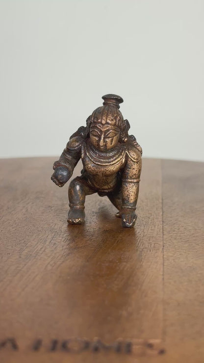 Crawling krishna - bronze idol
